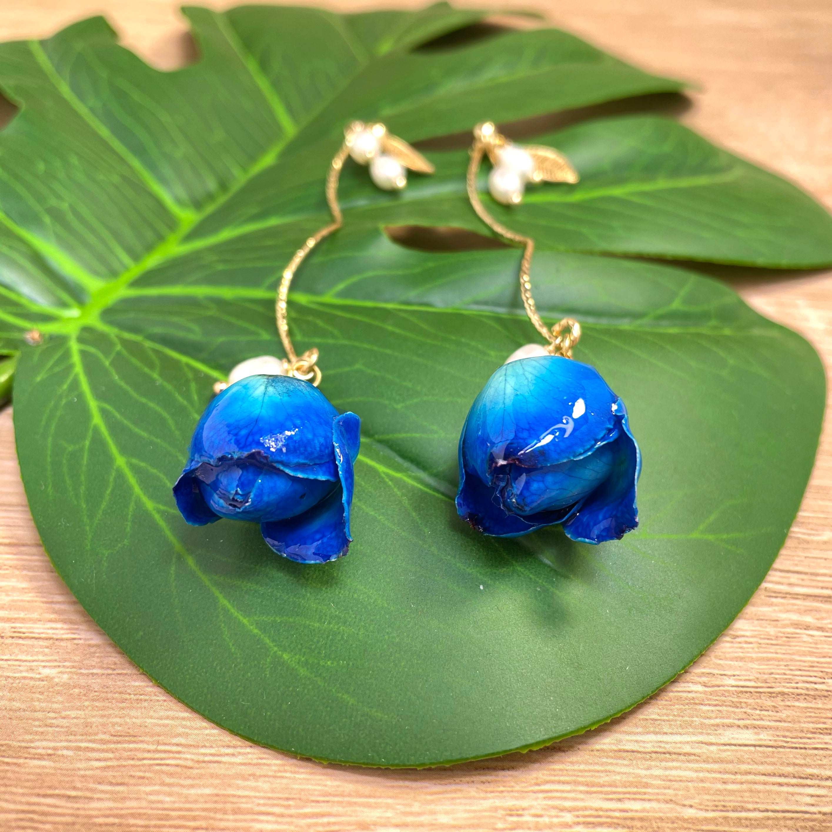 Long Drop Earrings with Blue Rose